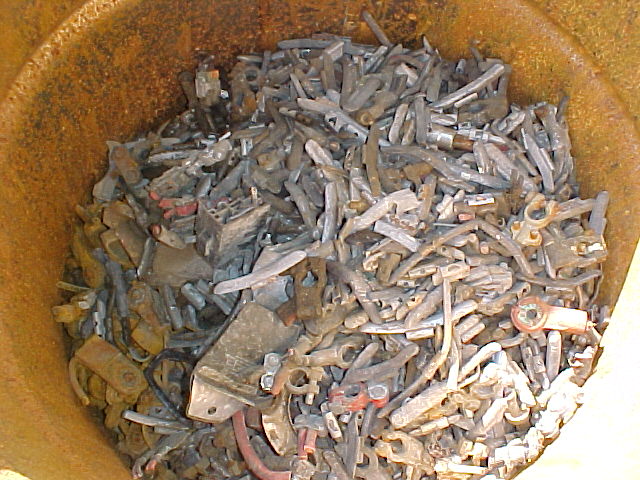 raw wheel weight scrap needs to be cleaned up and fluxed before casting.jpg